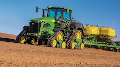 John Deere 8RX 410 Tractor fitted with ExactRate Tractor Tanks pulling a 1775 NT Planter.