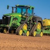 John Deere 8RX 410 Tractor fitted with ExactRate Tractor Tanks pulling a 1775 NT Planter.