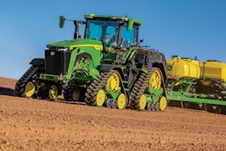John Deere 8RX 410 Tractor fitted with ExactRate Tractor Tanks pulling a 1775 NT Planter.