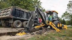 The John Deere 310 L backhoe loader has evolved greatly since the company's first machine was introduced 50 years ago.