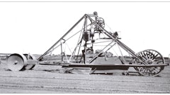 LeTourneau sold the Mountain Mover to an Eph Hahn in 1926. Here it is, sporting modifications made by the Hahns, including solid steel front wheels in place of the original spoked wheels and lowering the framework above the scoop to make it easier to transport.