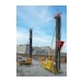 With enormous weight, the free-fall hammer falls into the driving pipe to compact concrete and gravel to the stable foot of the foundation pile. The SIKO rotary encoder WV58MR monitors, among other things, the positions of the winches.
