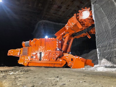 A 12HM46 continuous miner operates underground.