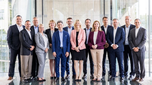 The newly established leadership team for Danfoss Power Solutions. Pictured left to right: Andrew Smulski, Ryan Williams, Jeff Herrin, Ann-Charlotte Budin, Astrid Mozes, Domenico Traverso, Thomas Beeker, Christina Fuchs, Eric Alström, Camie Melton Hanily, Alessandro Carmona, Daniel Winter, Henrik Jørgensen, and Jonathan Holloway.