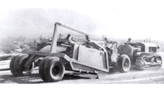 The first scraper to be equipped with pneumatic tires is pulled by an Allis-Chalmers crawler tractor in California’s Imperial Valley in August 1932.