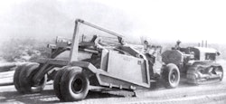The first scraper to be equipped with pneumatic tires is pulled by an Allis-Chalmers crawler tractor in California’s Imperial Valley in August 1932.