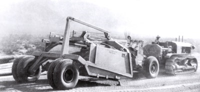 The first scraper to be equipped with pneumatic tires is pulled by an Allis-Chalmers crawler tractor in California’s Imperial Valley in August 1932.
