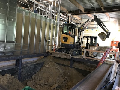 The Volvo ECR25 Electric at work with Casper Company.