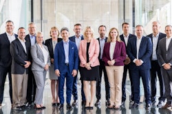 The newly established leadership team for Danfoss Power Solutions. Pictured left to right: Andrew Smulski, Ryan Williams, Jeff Herrin, Ann-Charlotte Budin, Astrid Mozes, Domenico Traverso, Thomas Beeker, Christina Fuchs, Eric Alström, Camie Melton Hanily, Alessandro Carmona, Daniel Winter, Henrik Jørgensen, and Jonathan Holloway.
