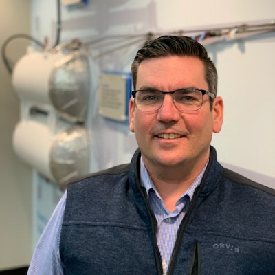 Adam Wilkum helps lead efforts to promote EV technology in the transportation industry.