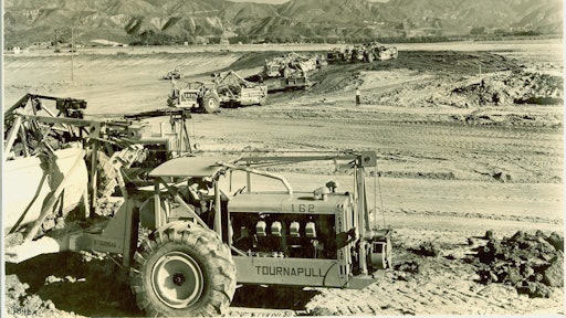 The first scraper to be equipped with pneumatic tires is pulled by an Allis-Chalmers crawler tractor in California’s Imperial Valley in August 1932.