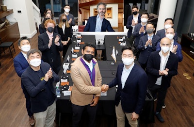 Hyundai Heavy Industries Group has formed a partnership with Palantir Technologies Inc. to create big data platforms for its various businesses. Pictured are Kisun Chung, CEO of Hyundai Heavy Industries Holdings, on the right in the front row, and Shyam Sankar, COO of Palantir on the left; and Alexander C. Karp, CEO of Palantir in the video in the upper center of the photo.