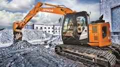 Hitachi Construction Machinery's parent company is selling half its shares in the business.