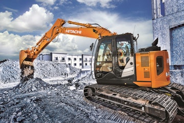 Hitachi Construction Machinery's parent company is selling half its shares in the business.