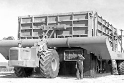 1. One of Mr. R. G.’s numerous outside-the-box, as it were, ideas was a Tournapull-powered means of pouring concrete buildings in place as a quick remedy to housing shortages. His system to achieve this revolved around the Tournalayer, a wildly overwidth trailer for A and B Tournapulls. The Tournalayer carried the complete outside forms for the structure to be poured, and after the inner forms for the outer walls had been erected the Tournalayer would be backed so as to position the outer forms above them, and then the outer forms would be lowered over the inner.