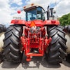 Tractor With Big Wheel And Red Metal Element On Back 5f861c49876cd