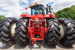 Tractor With Big Wheel And Red Metal Element On Back 5f861c49876cd