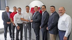 Motion and Gates officers at the award presentation (Left to right: Scott Wright, Gates; Chris Brewer, Joe Limbaugh and Kevin Storer with Motion; Grant Gawronski, Lou Rosen and Mark Guner with Gates; and Robert Anaforian, Motion)