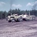 Image 1. A Euclid TDT series twin-power scraper’s extra power helped it take a healthy load of clay on the Massachusetts Turnpike in 1956.