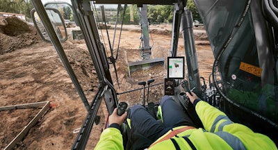 An operator using machine control