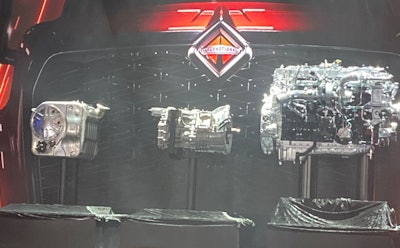 The full S13 Integrated Powertrain moves forward on the stage as it is unveiled.