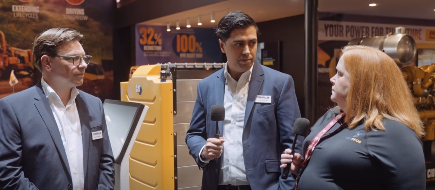 The Caterpillar team talks with Editor Lori Ditoro during bauma.