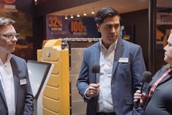 The Caterpillar team talks with Editor Lori Ditoro during bauma.