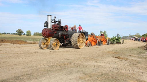 Who needs diesel engines and hydraulics, anyway? A 1918 Russell & Company 30/90 traction engine owned by Jim Lashaway of Bowling Green, Ohio, pulls two 1920 Baker Maney D wheeled scrapers and a 1929 Galion Leaning Wheel E-Z Lift No. 10 pull grader from the museum’s collection.