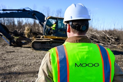 A construction engineer collects data on a vehicle being tested at a facility in West Seneca, New York.