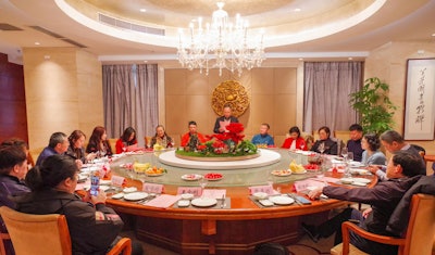 Representatives and experts from national business associations attend the CICEE Spring Symposium in Beijing.