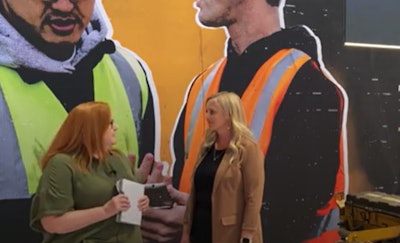 Lori Ditoro discusses Caterpillar's aftermarket benefits with Jessica Robertson, aftermarket sales manager.