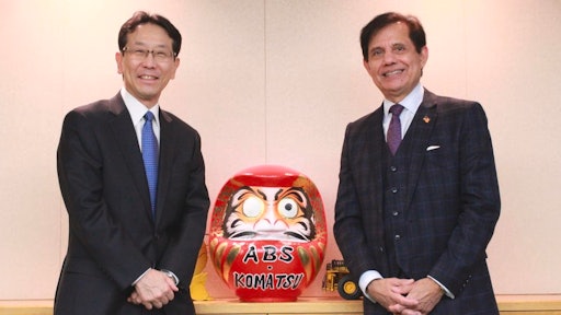 Hiroyuki Ogawa, president and CEO, Komatsu Ltd. (left) and Subhash Dhar, Founder, Chairman and CEO, ABS (right)