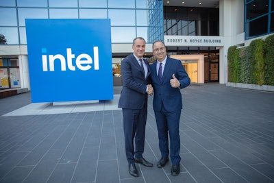 Cedrik Neike, CEO of Digital Industries and board member for Siemens AG and Keyvan Esfarjani, chief global operations officer for Intel Corp. pose for a photo to mark the signing of a memorandum of understanding by the companies to advance global manufacturing efforts. The deal was signed in Santa Clara, California, in December 2023.