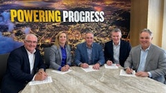 Executives from CRH sign the agreement with Caterpillar Group President Denise Johnson at the company’s headquarters in Irving, Texas.