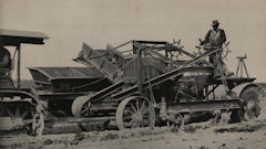Stroud called its traction drive system for elevating graders Ground Drive. Cleats on the left rear wheel keep turning to power the conveyor. (Stroud Road Machinery Company Bulletin 319, HCEA Archives)