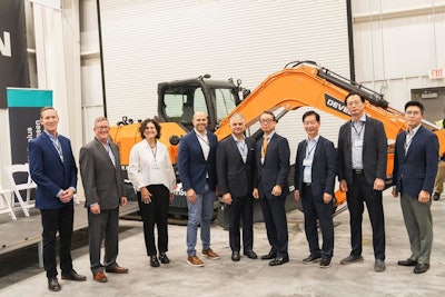 Representatives from Wallenius Wilhelmsen and leadership from HD Hyundai group / DEVELON celebrate the opening of the new customization plant in Brunswick, Georgia.