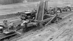 Figure 1: The 10BV was the largest BV loader offered to date when introduced in 1949. With the assistance of a push tractor and a load spotter on the lead tractor instead of the loader, this one is kicking the tonnage into Euclid bottom dumps. In material like this, a BV at full tilt could move a ton a second, and there was no cheaper way to do the job.