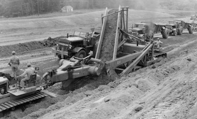Figure 1: The 10BV was the largest BV loader offered to date when introduced in 1949. With the assistance of a push tractor and a load spotter on the lead tractor instead of the loader, this one is kicking the tonnage into Euclid bottom dumps. In material like this, a BV at full tilt could move a ton a second, and there was no cheaper way to do the job.