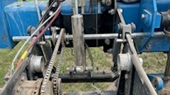 Figure 1. Row unit with damper installed