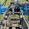 Figure 1. Row unit with damper installed