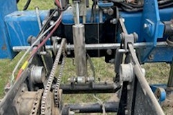 Figure 1. Row unit with damper installed