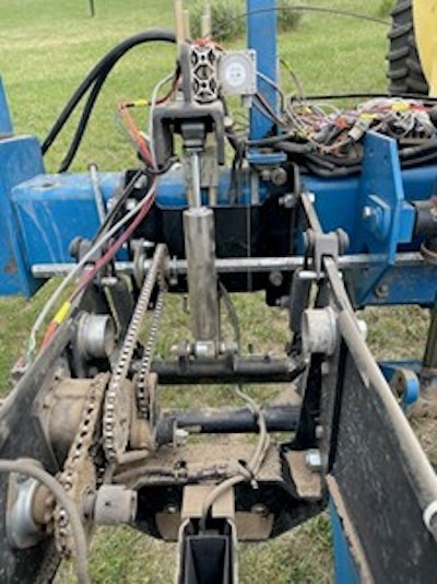 Figure 1. Row unit with damper installed