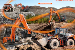Hitachi construction equipment working in rocky quarry landscape