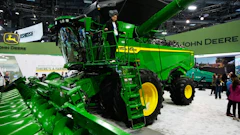 An attendee experiences the X9 1100 combine at John Deere's booth at CES 2026 in January.