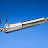 Linear position transducer with silver metal housing, white connector body, and dual mounting brackets on blue background